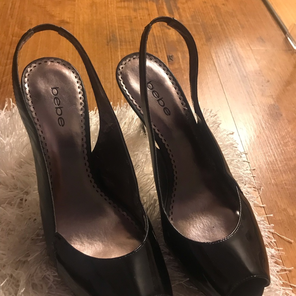 Sling back peep toe pumps